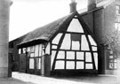 View: c00186 Frodsham: Thatched building, Main Street 	