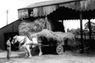 View: c00697 Great Barrow: Moving hay on the Farm