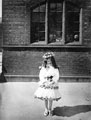 View: c01112 Knutsford: Girl Dressed up for May Day 	