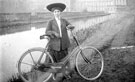 View: c02805 Bollington: Lady with a Bicycle 	