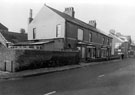 View: c04043 Ellesmere Port: Merseyton Road Houses and Bakery from junction Oak Street 	