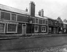 View: c04066 Ellesmere Port: Dock Street, Bulls Head and three shops 	