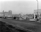 View: c04076 Ellesmere Port: Dock Street Garage Brazier Bros. Dock Wall and Flour Mills 	