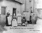 View: c04289 Toft: Betty Webster sitting and her neighbours, 	