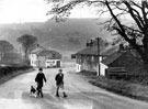 View: c04945 Walker Barn: Boys on the road through the village 	